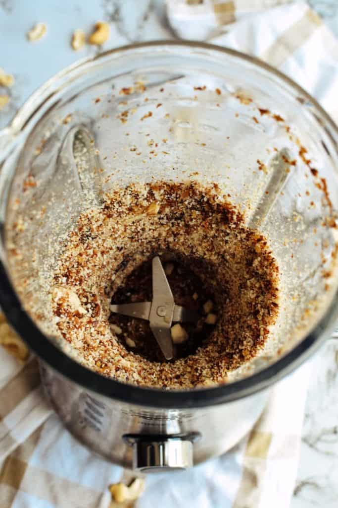 blending the nuts for raw nut crust