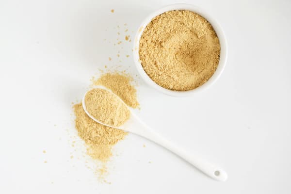 nutritional yeast spilled on counter