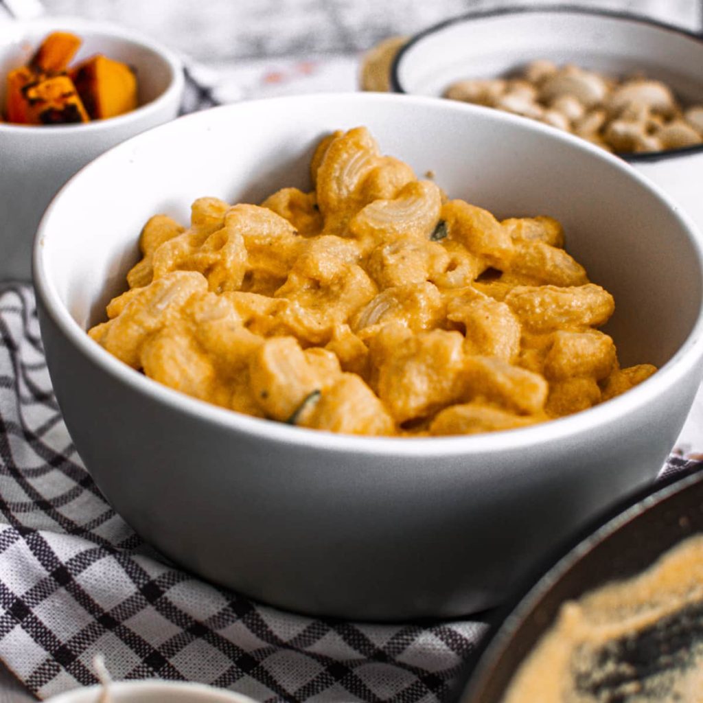 closeup of vegan butternut squash mac and cheese in bowl