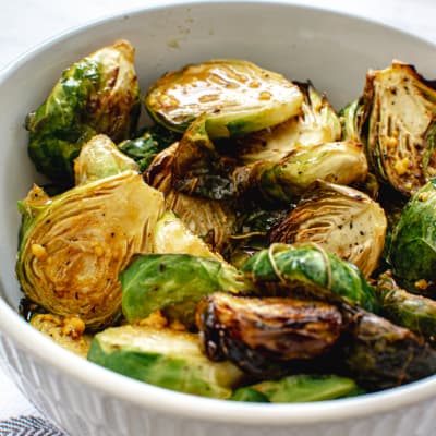 closeup of maple balsamic brussels sprouts in bowl