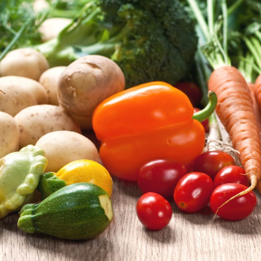 closeup of freshly picked garden vegetables that kids love